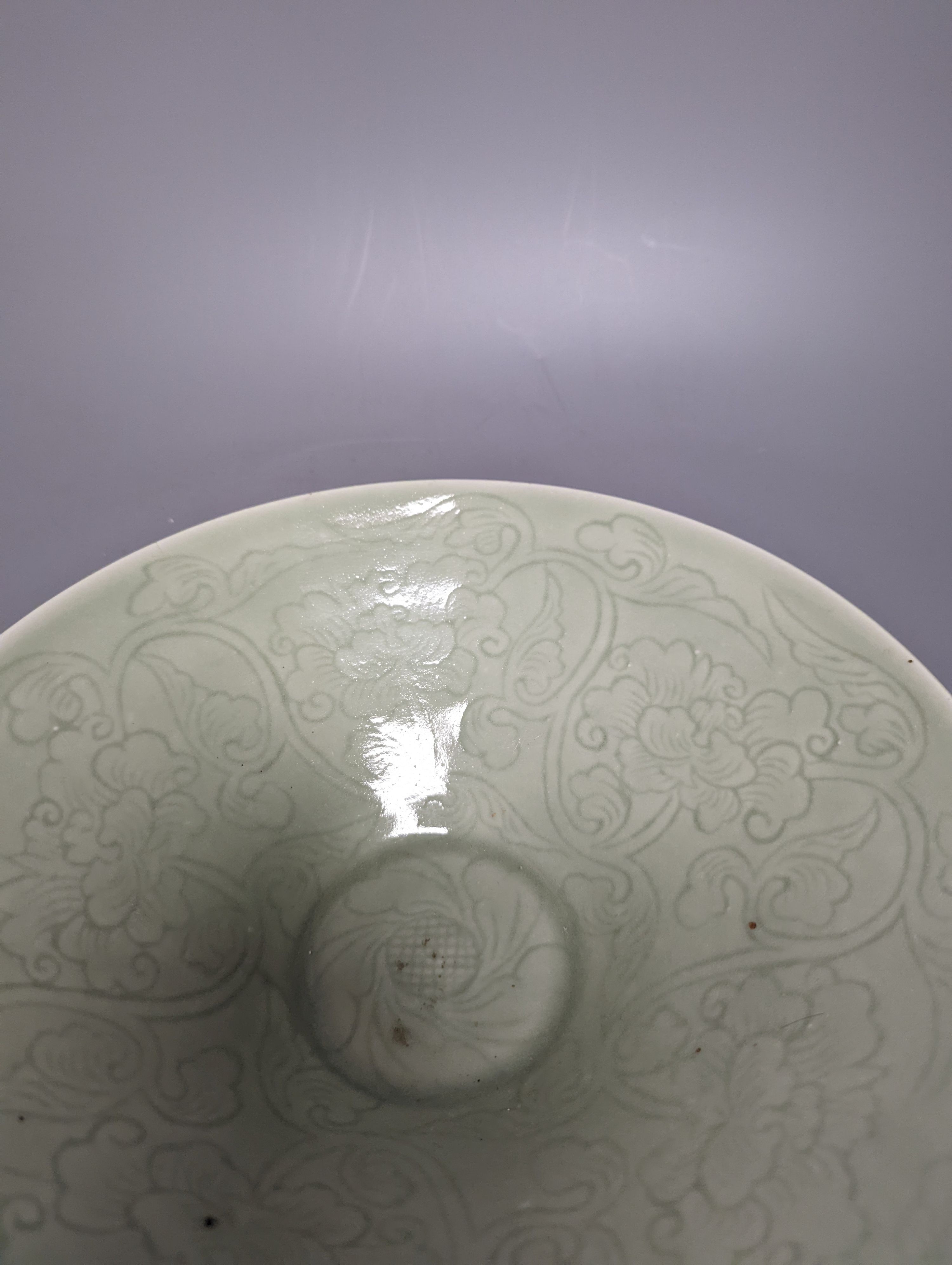 A 19th century Chinese sgraffito celadon glazed dish, diameter 26cm